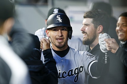 Apr 5, 2021; Seattle, Washington, USA; Chicago White Sox catcher Yasmani Grandal (24) celebrates in the dugout after hitting a solo home run against the Seattle Mariners during the second inning at T-Mobile Park. Mandatory Credit: Joe Nicholson-USA TODAY Sports