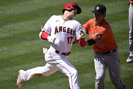 Apr 6, 2021; Anaheim, California, USA; Houston Astros starting pitcher Zack Greinke (21) tags out Los Angeles Angels designated hitter Shohei Ohtani (17) during the fifth inning at Angel Stadium. Mandatory Credit: Kelvin Kuo-USA TODAY Sports