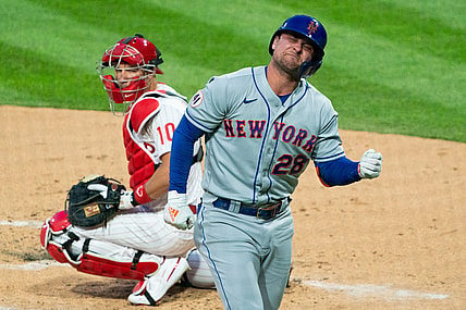 Apr 6, 2021; Philadelphia, Pennsylvania, USA; New York Mets left fielder J.D. Davis (28) reacts in front of Philadelphia Phillies catcher J.T. Realmuto (10) after being hit by a pitch during the first inning at Citizens Bank Park. Mandatory Credit: Bill Streicher-USA TODAY Sports