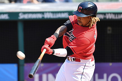 Apr 7, 2021; Cleveland, Ohio, USA; Cleveland Indians third baseman Jose Ramirez (11) hits a two run home run during the sixth inning against the Kansas City Royals at Progressive Field. Mandatory Credit: Ken Blaze-USA TODAY Sports