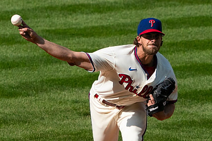 Apr 7, 2021; Philadelphia, Pennsylvania, USA; Philadelphia Phillies starting pitcher Aaron Nola (27) pitches during the first inning against the New York Mets at Citizens Bank Park. Mandatory Credit: Bill Streicher-USA TODAY Sports