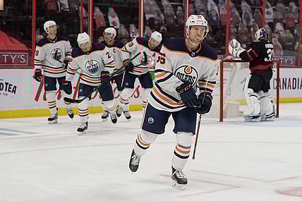 Apr 8, 2021; Ottawa, Ontario, CAN; Edmonton Oilers right wing Kailer Yamamoto (56) skates to the bench following a goal scored during the second period against the Ottawa Senators at the Canadian Tire Centre. Mandatory Credit: Marc DesRosiers-USA TODAY Sports