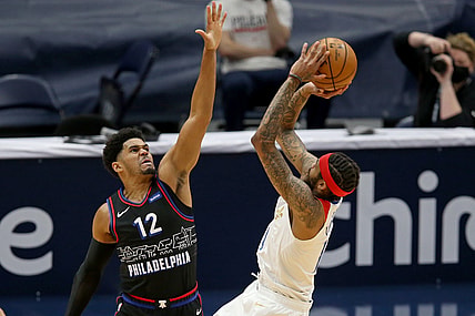Apr 9, 2021; New Orleans, Louisiana, USA; Philadelphia 76ers forward Tobias Harris (12) defends New Orleans Pelicans forward Brandon Ingram (14) in the first quarter at the Smoothie King Center. Mandatory Credit: Chuck Cook-USA TODAY Sports