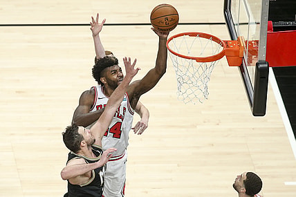 Apr 9, 2021; Atlanta, Georgia, USA; Chicago Bulls forward Patrick Williams (44) shoots past Atlanta Hawks forward Danilo Gallinari (8) in the fourth quarter at State Farm Arena. Mandatory Credit: Brett Davis-USA TODAY Sports