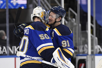 Apr 9, 2021; St. Louis, Missouri, USA; St. Louis Blues right wing Vladimir Tarasenko (91) congratulates St. Louis Blues goaltender Jordan Binnington (50) after beating the Minnesota Wild 9-1 at Enterprise Center. Mandatory Credit: Joe Puetz-USA TODAY Sports