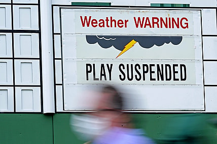 Apr 10, 2021; Augusta, Georgia, USA; A leaderboard shows that play has been suspended during the third round of The Masters golf tournament. Mandatory Credit: Michael Madrid-USA TODAY Sports