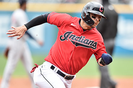 Apr 11, 2021; Cleveland, Ohio, USA; Cleveland Indians shortstop Andres Gimenez (0) rounds third base en route to scoring during the third inning against the Detroit Tigers at Progressive Field. Mandatory Credit: Ken Blaze-USA TODAY Sports