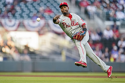 Apr 11, 2021; Cumberland, Georgia, USA; Philadelphia Phillies shortstop Jean Segura (2) throws to first base late on a single by Atlanta Braves third baseman Austin Riley (not pictured) during the first inning at Truist Park. Mandatory Credit: Dale Zanine-USA TODAY Sports