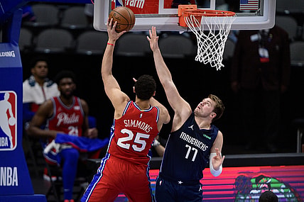 Apr 12, 2021; Dallas, Texas, USA; Dallas Mavericks guard Luka Doncic (77) guards Philadelphia 76ers guard Ben Simmons (25) during the first quarter at the American Airlines Center. Mandatory Credit: Jerome Miron-USA TODAY Sports