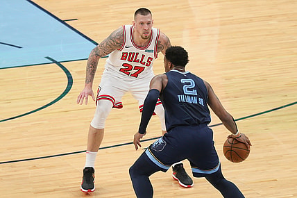 Apr 12, 2021; Memphis, Tennessee, USA; Memphis Grizzlies Xavier Tillman (2) dribbles the ball against Chicago Bulls center Daniel Theis (27)  the first half at FedExForum. Mandatory Credit: Nelson Chenault-USA TODAY Sports
