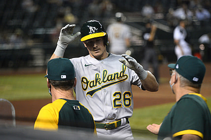 Apr 12, 2021; Phoenix, Arizona, USA; Oakland Athletics third baseman Matt Chapman (26) returns to the dugout after hitting a solo home run against the Arizona Diamondbacks during the fifth inning at Chase Field. Mandatory Credit: Joe Camporeale-USA TODAY Sports