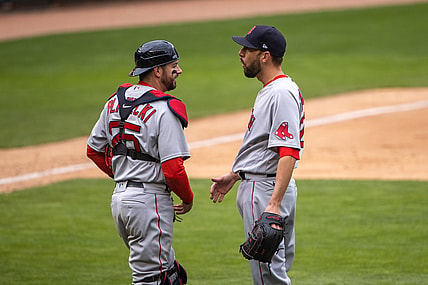 Apr 14, 2021; Minneapolis, Minnesota, USA; Boston Red Sox relief pitcher Matt Barnes (32) and catcher Kevin Plawecki (25) celebrate after defeating the Minnesota Twins at Target Field. Mandatory Credit: Jesse Johnson-USA TODAY Sports