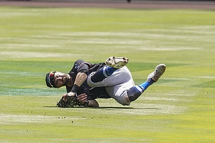 Apr 15, 2021; Cumberland, Georgia, USA; Miami Marlins second baseman Jon Berti (5) makes a running catch in shallow center field on a ball hit by Atlanta Braves second baseman Ozzie Albies (1) (not shown) during the second inning at Truist Park. Mandatory Credit: Dale Zanine-USA TODAY Sports