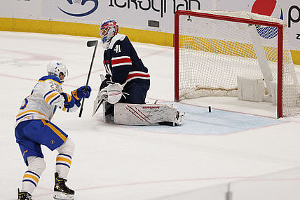 Apr 15, 2021; Washington, District of Columbia, USA; Buffalo Sabres right wing Sam Reinhart (23) celebrates after deflecting the puck past Washington Capitals goaltender Vitek Vanecek (41) in the first period at Capital One Arena. Mandatory Credit: Geoff Burke-USA TODAY Sports