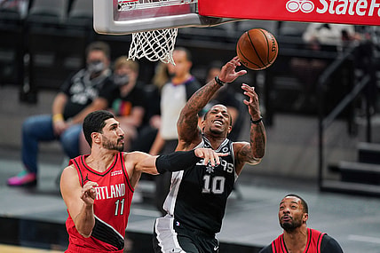 Apr 16, 2021; San Antonio, Texas, USA; San Antonio Spurs forward DeMar DeRozan (10) shoots in the first half against the Portland Trail Blazers at the AT&T Center. Mandatory Credit: Daniel Dunn-USA TODAY Sports
