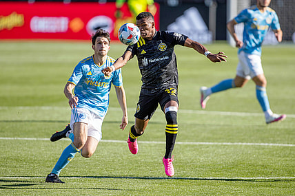 Apr 18, 2021; Columbus, Ohio, USA; Columbus Crew SC midfielder Luis Diaz (12) heads the ball in the first half against the Philadelphia Union  at Historic Crew Stadium. Mandatory Credit: Trevor Ruszkowski-USA TODAY Sports