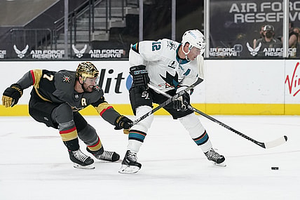 Apr 19, 2021; Las Vegas, Nevada, USA;  San Jose Sharks center Patrick Marleau (12) skates around Vegas Golden Knights defenseman Alex Pietrangelo (7) during the first period at T-Mobile Arena. Mandatory Credit:  John Locher/POOL PHOTOS-USA TODAY Sports