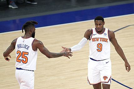 Apr 20, 2021; New York, New York, USA;  RJ Barrett #9 high-fives Reggie Bullock #25 of the New York Knicks during the second half against the Charlotte Hornets at Madison Square Garden. Mandatory Credit:  Sarah Stier/POOL PHOTOS-USA TODAY Sports