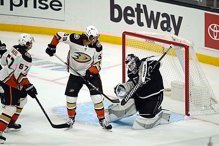 Apr 20, 2021; Los Angeles, California, USA; LA Kings goaltender Calvin Petersen (40) defends the goal against Anaheim Ducks left wing Max Comtois (53) in the first period at Staples Center. Mandatory Credit: Kirby Lee-USA TODAY Sports