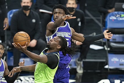 April 20, 2021; Sacramento, California, USA; Minnesota Timberwolves center Naz Reid (11) shoots the basketball against Sacramento Kings forward Chimezie Metu (25) during the second quarter at Golden 1 Center. Mandatory Credit: Kyle Terada-USA TODAY Sports