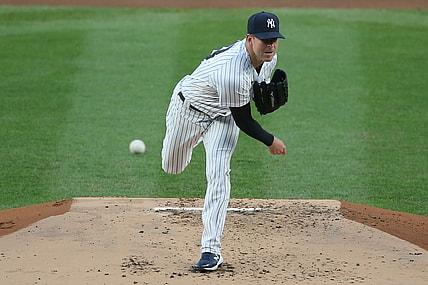 Apr 21, 2021; Bronx, New York, USA; New York Yankees starting pitcher Corey Kluber (28) throws against the Atlanta Braves during the second inning at Yankee Stadium. Mandatory Credit: Brad Penner-USA TODAY Sports