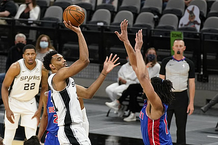 Apr 22, 2021; San Antonio, Texas, USA; San Antonio Spurs forward Keita Bates-Diop (31) shoots over Detroit Pistons center Jahlil Okafor (13) in the first quarter at AT&T Center. Mandatory Credit: Scott Wachter-USA TODAY Sports