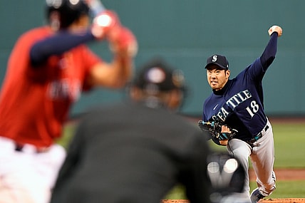Apr 23, 2021; Boston, Massachusetts, USA; Seattle Mariners starting pitcher Yusei Kikuchi (18) pitches against the Boston Red Sox during the first inning at Fenway Park. Mandatory Credit: Brian Fluharty-USA TODAY Sports