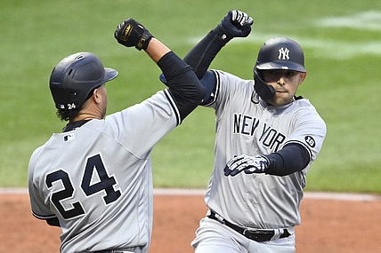 Apr 23, 2021; Cleveland, Ohio, USA; New York Yankees second baseman Rougned Odor (R) celebrates his two-run home run with catcher Gary Sanchez (24) during the second inning against the Cleveland Indians at Progressive Field. Mandatory Credit: David Richard-USA TODAY Sports