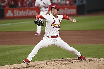 Apr 23, 2021; St. Louis, Missouri, USA; St. Louis Cardinals starting pitcher Kwang Hyun Kim (33) pitches against the Cincinnati Reds in the third inning at Busch Stadium. Mandatory Credit: Joe Puetz-USA TODAY Sports