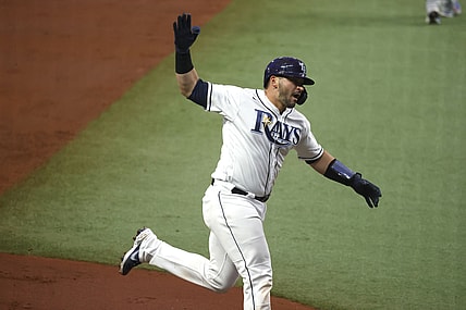 Apr 24, 2021; St. Petersburg, Florida, USA;Tampa Bay Rays catcher Mike Zunino (10) celebrates as he hits a home run during the second inning against the Toronto Blue Jays  at Tropicana Field. Mandatory Credit: Kim Klement-USA TODAY Sports