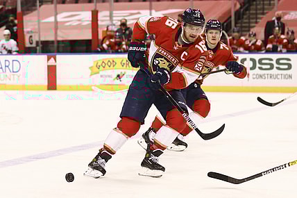 Apr 24, 2021; Sunrise, Florida, USA; Florida Panthers center Aleksander Barkov (16) skates with the puck against the Carolina Hurricanes during the second period at BB&T Center. Mandatory Credit: Sam Navarro-USA TODAY Sports