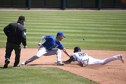 Apr 25, 2021; Detroit, Michigan, USA; Kansas City Royals second baseman Whit Merrifield (15) tags Detroit Tigers third baseman Niko Goodrum (28) out at second base during the fourth inning at Comerica Park. Mandatory Credit: Tim Fuller-USA TODAY Sports