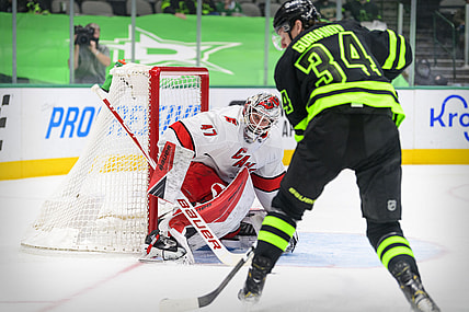 Apr 26, 2021; Dallas, Texas, USA; Carolina Hurricanes goaltender James Reimer (47) faces a shot by Dallas Stars right wing Denis Gurianov (34) during the second period at the American Airlines Center. Mandatory Credit: Jerome Miron-USA TODAY Sports
