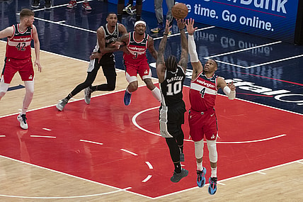 Apr 26, 2021; Washington, District of Columbia, USA;  Washington Wizards guard Russell Westbrook (4) contests ]San Antonio Spurs forward DeMar DeRozan (10) shoot as time expires during the second  half at Capital One Arena. Mandatory Credit: Tommy Gilligan-USA TODAY Sports