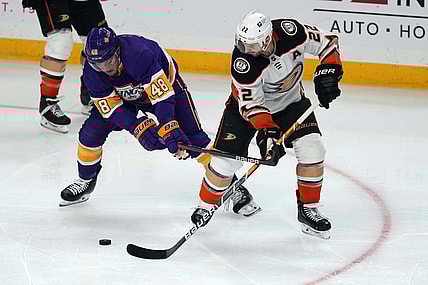 Apr 26, 2021; Los Angeles, California, USA; LA Kings left wing Brendan Lemieux (48) and Anaheim Ducks defenseman Kevin Shattenkirk (22) battle for the puck during the second  period at Staples Center. Mandatory Credit: Kirby Lee-USA TODAY Sports