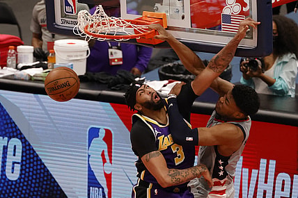 Apr 28, 2021; Washington, District of Columbia, USA; Washington Wizards forward Rui Hachimura (8) dunks the ball over Los Angeles Lakers forward Anthony Davis (3) in the third quarter at Capital One Arena. Mandatory Credit: Geoff Burke-USA TODAY Sports