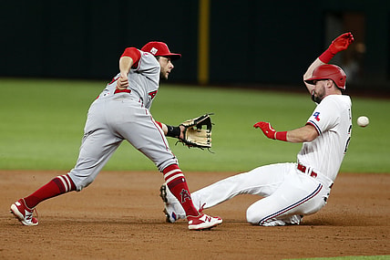 Apr 28, 2021; Arlington, Texas, USA; Texas Rangers left fielder David Dahl (21) is caught stealing by Los Angeles Angels second baseman David Fletcher (22) in the third inning at Globe Life Field. Mandatory Credit: Tim Heitman-USA TODAY Sports