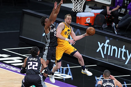 Apr 28, 2021; Sacramento, California, USA; Utah Jazz guard Joe Ingles (2) passes the ball against Sacramento Kings guard Buddy Hield (24) during the first quarter at Golden 1 Center. Mandatory Credit: Sergio Estrada-USA TODAY Sports