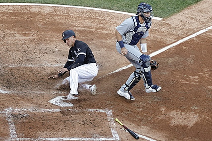 Apr 29, 2021; Chicago, Illinois, USA; Chicago White Sox third baseman Jake Lamb (23) scores against the Detroit Tigers during the fifth inning of the first game of a doubleheader at Guaranteed Rate Field. Mandatory Credit: Kamil Krzaczynski-USA TODAY Sports