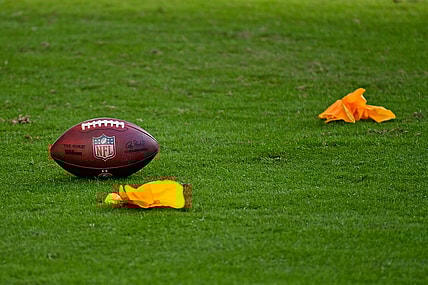 Dec 13, 2020; Miami Gardens, Florida, USA; A football and penalty flags as seen on the field during the second half between the Miami Dolphins and the Kansas City Chiefs at Hard Rock Stadium. Mandatory Credit: Jasen Vinlove-USA TODAY Sports