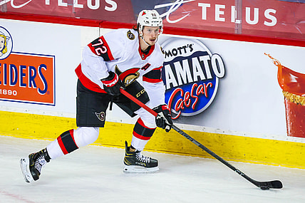 Apr 19, 2021; Calgary, Alberta, CAN; Ottawa Senators defenseman Thomas Chabot (72) skates with the puck against the Calgary Flames during the third period at Scotiabank Saddledome. Mandatory Credit: Sergei Belski-USA TODAY Sports