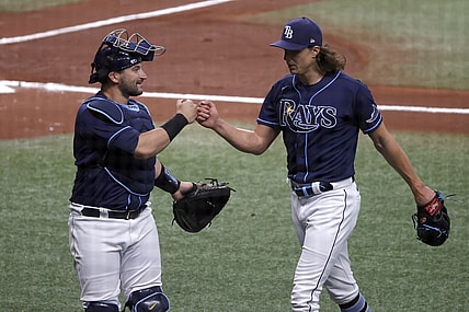 Apr 28, 2021; St. Petersburg, Florida, USA;  Tampa Bay Rays starting pitcher Tyler Glasnow (20) is congratulated by  catcher Mike Zunino (10) at the end of the second inning against the Oakland Athletics at Tropicana Field. Mandatory Credit: Kim Klement-USA TODAY Sports