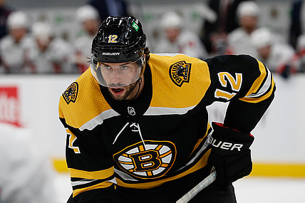 Apr 18, 2021; Boston, Massachusetts, USA; Boston Bruins right wing Craig Smith (12) during the first period against the Washington Capitals at TD Garden. Mandatory Credit: Winslow Townson-USA TODAY Sports