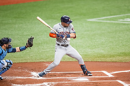 May 1, 2021; St. Petersburg, Florida, USA; Houston Astros third baseman Alex Bregman (2) shrugs to avoid a pitch during the first inning of a game against the Tampa Bay Rays at Tropicana Field. Mandatory Credit: Mary Holt-USA TODAY Sports