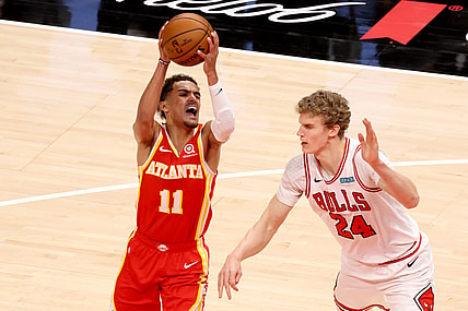 May 1, 2021; Atlanta, Georgia, USA; Atlanta Hawks guard Trae Young (11) attempts a shot against Chicago Bulls forward Lauri Markkanen (24) during the first quarter at State Farm Arena. Mandatory Credit: Jason Getz-USA TODAY Sports