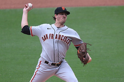 May 2, 2021; San Diego, California, USA; San Francisco Giants starting pitcher Kevin Gausman (34) pitches against the San Diego Padres during the fifth inning at Petco Park. Mandatory Credit: Orlando Ramirez-USA TODAY Sports