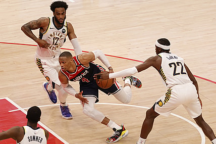 May 3, 2021; Washington, District of Columbia, USA; Washington Wizards guard Russell Westbrook (4) drives to the basket past Indiana Pacers guard Caris LeVert (22) in the second quarter at Capital One Arena. Mandatory Credit: Geoff Burke-USA TODAY Sports