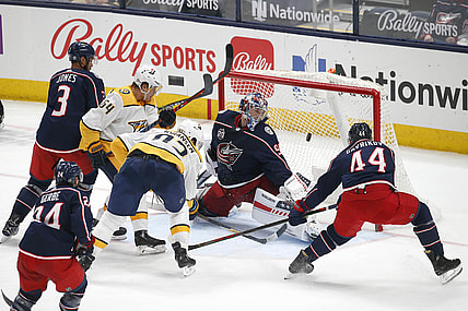 May 3, 2021; Columbus, Ohio, USA; Columbus Blue Jackets goalie Elvis Merzlikins (90) looks back as the shot from Nashville Predators center Ryan Johansen (92) goes in to the goal during the second period at Nationwide Arena. Mandatory Credit: Russell LaBounty-USA TODAY Sports