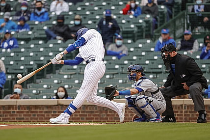 May 4, 2021; Chicago, Illinois, USA; Chicago Cubs third baseman Kris Bryant (17) doubles against the Los Angeles Dodgers during the first inning of the first game of a doubleheader at Wrigley Field. Mandatory Credit: Kamil Krzaczynski-USA TODAY Sports