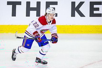 Apr 26, 2021; Calgary, Alberta, CAN; Montreal Canadiens right wing Cole Caufield (22) skates against the Calgary Flames during the third period at Scotiabank Saddledome. Mandatory Credit: Sergei Belski-USA TODAY Sports